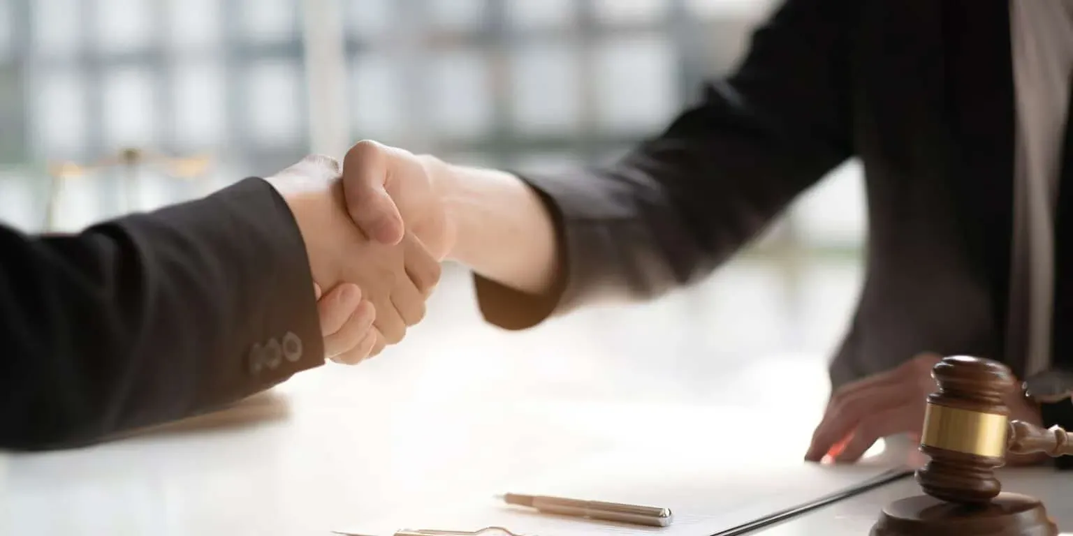 bigstock-Businessman-Shaking-Hands-Part-459858001-min-1536x768.webp