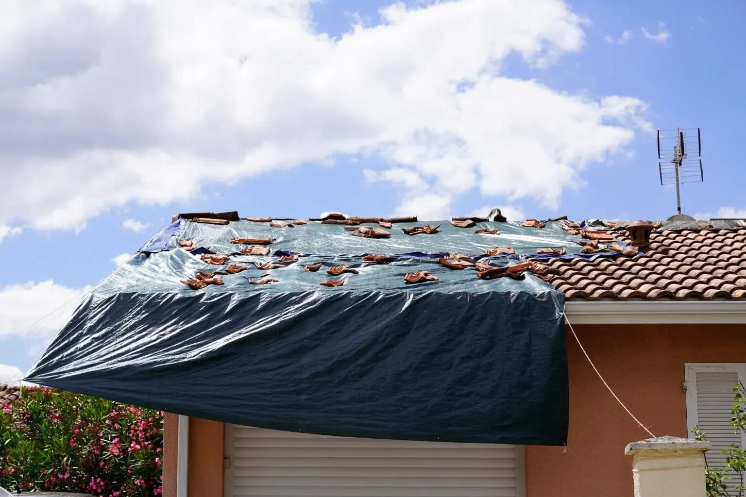 bigstock-Storm-Damaged-Roof-On-House-Wi-461259755-min-1536x1024.webp