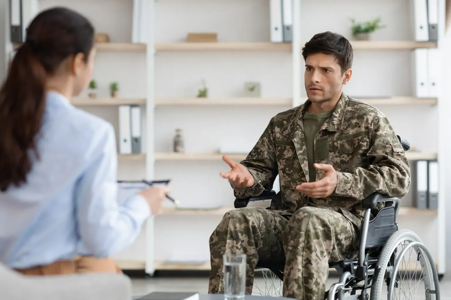 bigstock-Unhappy-Disabled-Young-Man-Mil-449243827-min-1536x1024.webp