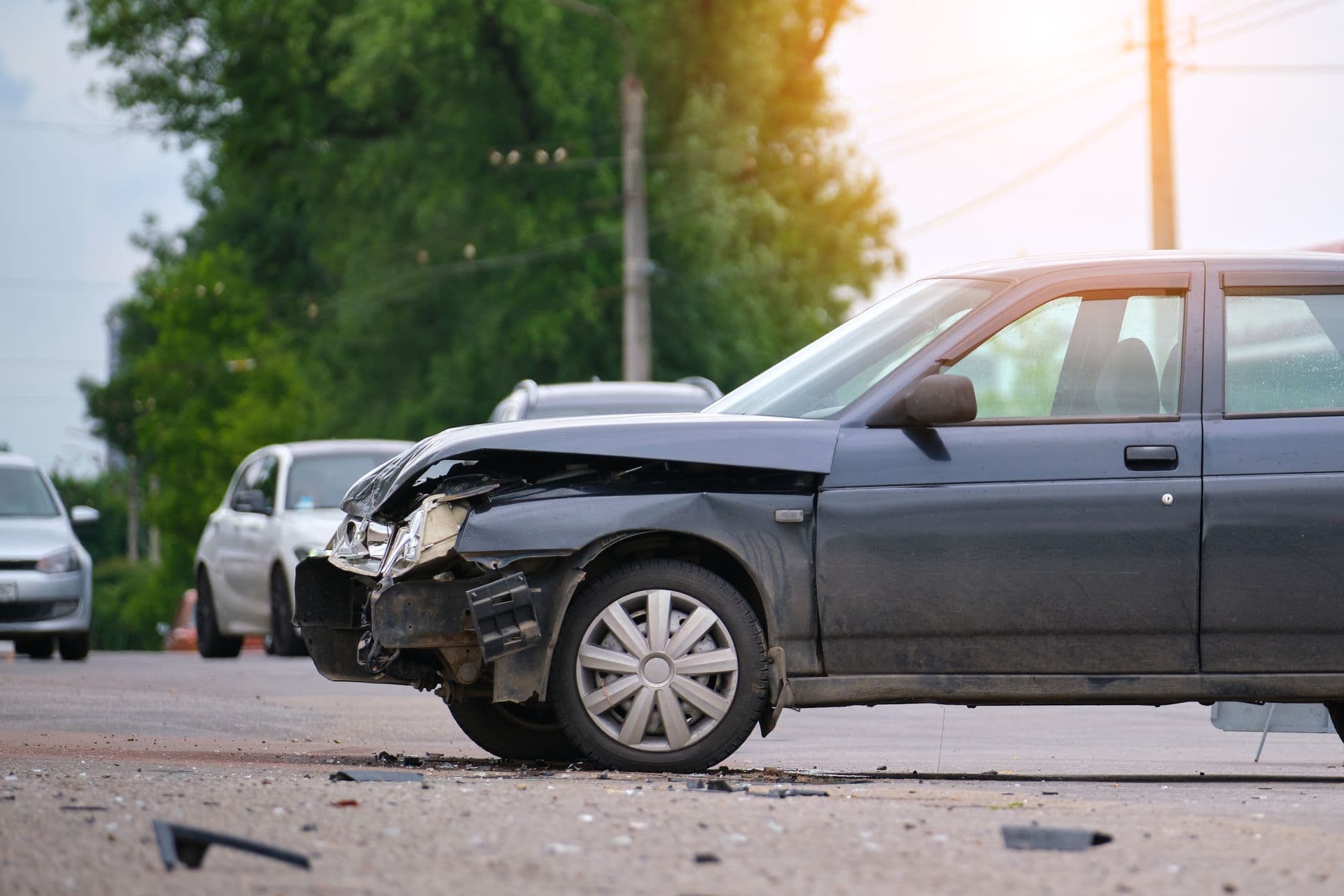 damaged-in-car-accident-vehicle-on-city-street-cra-2024-12-06-16-31-07-utc.jpg